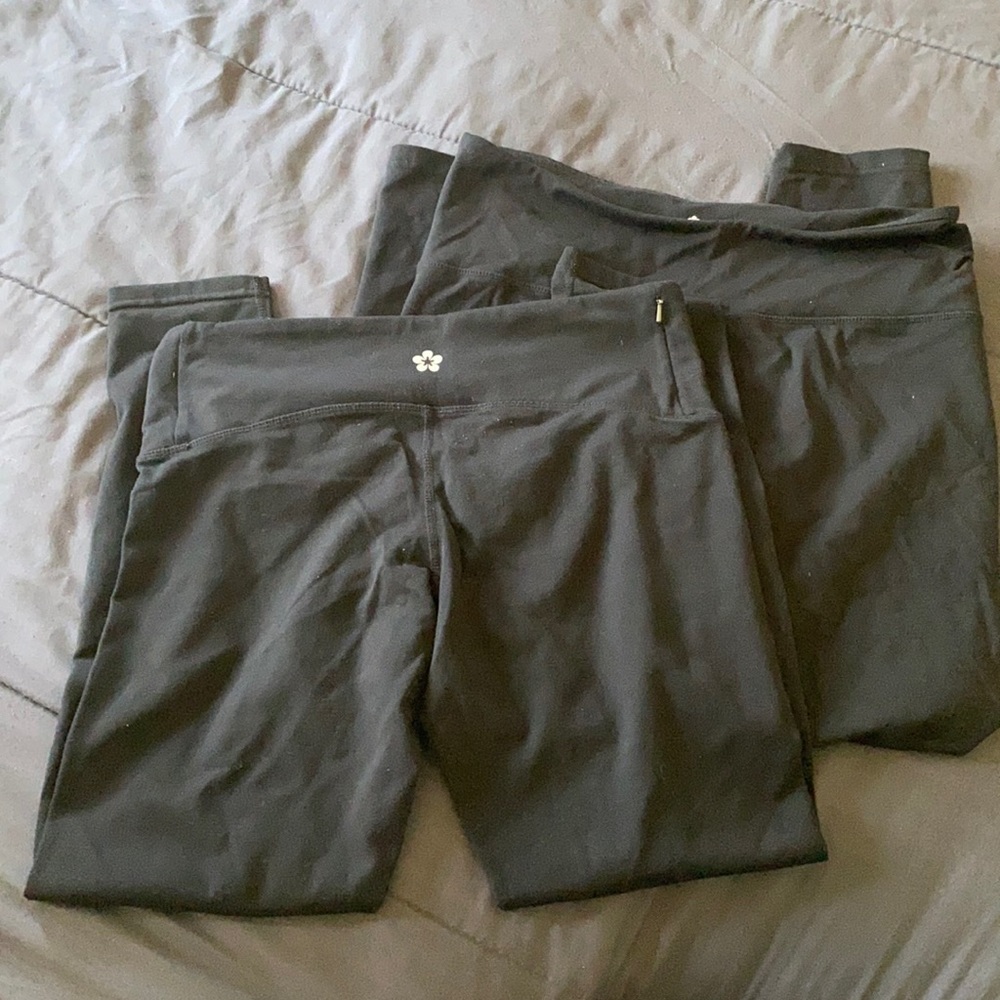 2 pairs of tuff athletics leggings with side zip